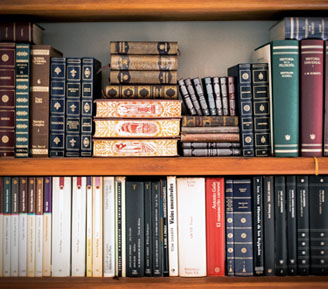 a bookcase full of thick law books